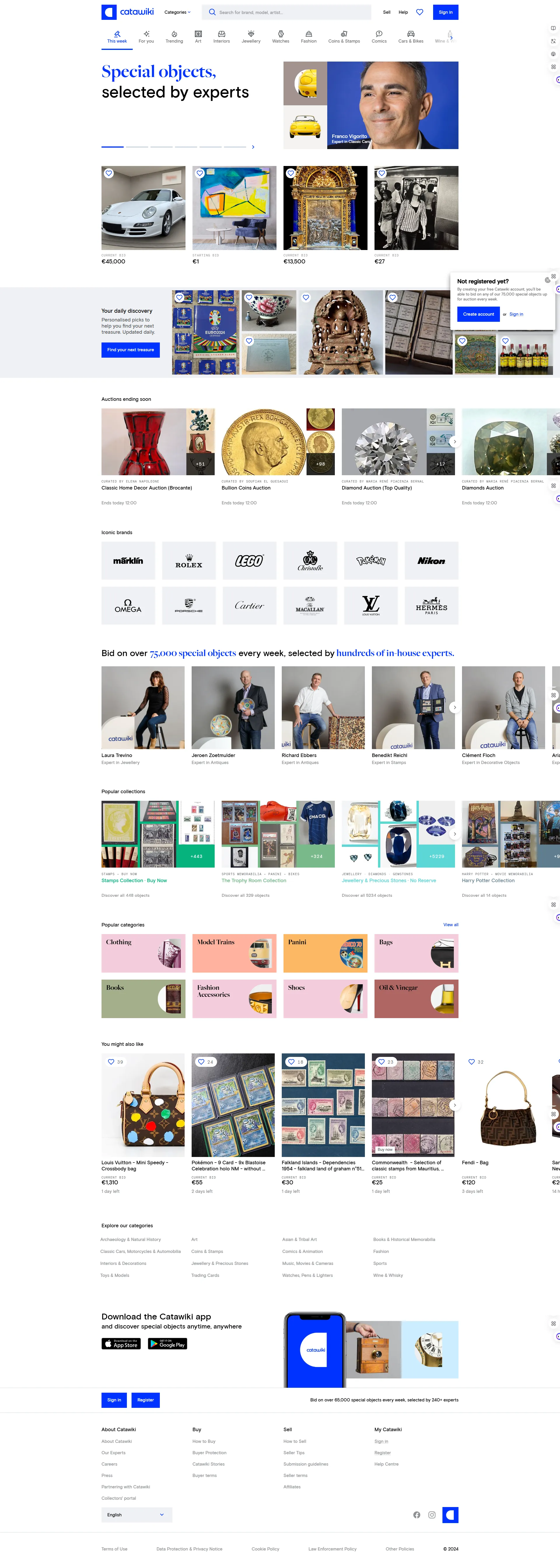 Guida alle tipologie di siti web 9 Esempio di sito aste online specializzato: homepage di Catawiki che mostra la validazione degli esperti, categorie di prodotti di lusso e collezione, interfaccia per le aste in corso e loghi dei brand premium
